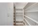A well-organized, walk-in pantry with ample shelving space for storing groceries and supplies at 5588 Ness Ave, Las Vegas, NV 89118
