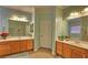 Bathroom featuring double sinks and plentiful counter space at 5772 Flying Birdie Ave, Las Vegas, NV 89122