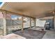 Outdoor covered patio perfect for relaxation and grilling, offering a great backyard view at 5921 Royal Castle Ln, Las Vegas, NV 89130