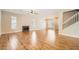 Spacious living room with wood floors, fireplace, and plenty of natural light at 5921 Royal Castle Ln, Las Vegas, NV 89130