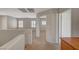 Second floor hallway with multiple windows, carpet flooring and neutral color scheme at 6424 Bombax Ct, Las Vegas, NV 89141