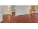 Hardwood floors and a glimpse of a bathroom, enhancing its appeal at 6424 Bombax Ct, Las Vegas, NV 89141