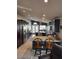 Bright kitchen featuring granite counters, stainless steel appliances, and tile flooring at 7136 Overhill, Las Vegas, NV 89129