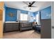 This Bedroom features blue walls, a crib, and a gray dresser at 7237 Puddle Duck St, Las Vegas, NV 89166