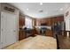 Modern kitchen features stainless steel appliances, tile floors, and ample cabinet space at 7237 Puddle Duck St, Las Vegas, NV 89166
