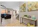Inviting living area with tile flooring, comfortable seating, and ample natural light, great for relaxation at 7237 Puddle Duck St, Las Vegas, NV 89166