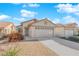 Charming single-story home featuring a low-maintenance desert landscape and an attached two-car garage at 8127 Chambersberg St, Las Vegas, NV 89147