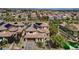 A lovely aerial view of the home with solar panels, surrounding homes, and community at 884 Loma Bonita Pl, Las Vegas, NV 89138