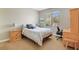 Comfortable bedroom with a desk and natural light from the window at 884 Loma Bonita Pl, Las Vegas, NV 89138
