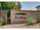 Attractive entrance sign for Las Lomas community, accented with desert landscaping at 884 Loma Bonita Pl, Las Vegas, NV 89138