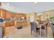 Bright kitchen featuring granite countertops, stainless steel appliances, and a central island at 884 Loma Bonita Pl, Las Vegas, NV 89138