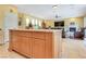 Open kitchen with granite countertops and stainless steel appliances at 884 Loma Bonita Pl, Las Vegas, NV 89138
