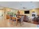 Spacious living room with large TV, fireplace, and stylish furniture at 884 Loma Bonita Pl, Las Vegas, NV 89138