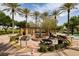 Charming picnic area with tables and shade provides a perfect spot for outdoor dining and relaxation at 884 Loma Bonita Pl, Las Vegas, NV 89138