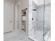 Sleek bathroom showcasing glass shower with seat and custom tile work at 9 Chalet Hills Ter, Henderson, NV 89052