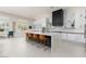Large kitchen with a center island with seating, and white cabinetry at 9 Chalet Hills Ter, Henderson, NV 89052