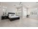 Serene bedroom with large windows and neutral decor at 9 Chalet Hills Ter, Henderson, NV 89052