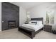Comfortable bedroom featuring a fireplace and natural light at 9 Chalet Hills Ter, Henderson, NV 89052