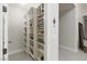 Organized walk-in pantry featuring ample shelving and storage solutions at 9 Chalet Hills Ter, Henderson, NV 89052