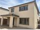 View of the back of the home showing the two-story structure and covered patio area at 96 Via Franello, Henderson, NV 89011