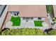 Overhead shot of house and yard featuring concrete patio, artificial turf, and desert landscaping at 9813 Folsom Dr, Las Vegas, NV 89134