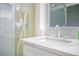 Modern bathroom showcases white marble countertop, sleek faucet, and frameless glass shower at 9813 Folsom Dr, Las Vegas, NV 89134