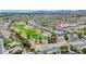 Aerial photo showing property's location within a residential neighborhood near golf course and community amenities at 9813 Folsom Dr, Las Vegas, NV 89134