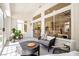 Inviting sunroom featuring ample natural light, comfortable seating, and views of the outdoors, a tranquil space for relaxation at 9813 Folsom Dr, Las Vegas, NV 89134