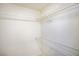 Empty walk-in closet with white wire shelving ready for organizing clothes and accessories at 9813 Folsom Dr, Las Vegas, NV 89134