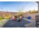 Landscaped backyard with fire pit and string lights at 10031 Fletcher Peak Ave, Las Vegas, NV 89178