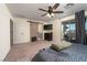 Spacious main bedroom features a sliding glass door and ceiling fan, providing lots of natural light at 10031 Fletcher Peak Ave, Las Vegas, NV 89178