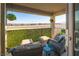 Cozy patio area with comfortable seating and a view of the neighborhood at 10031 Fletcher Peak Ave, Las Vegas, NV 89178