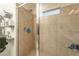 Glass enclosed shower with a rain shower head at 10031 Fletcher Peak Ave, Las Vegas, NV 89178
