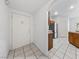 Bright tiled entrance with stainless steel appliances and kitchen in view at 10116 Jacob Pl # 104, Las Vegas, NV 89144