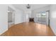 Bright living room featuring wood floors, a fireplace, and a sliding glass door to outdoor space at 10116 Jacob Pl # 104, Las Vegas, NV 89144