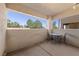 Covered patio area with seating, offering a tranquil outdoor living space at 10116 Jacob Pl # 104, Las Vegas, NV 89144