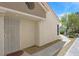 Inviting front porch with secure door, textured wall, and pathway to the home at 1658 Autumn Rust Dr, Las Vegas, NV 89119