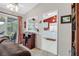 Cozy living room with view of kitchen and sliding doors to outdoor space at 1658 Autumn Rust Dr, Las Vegas, NV 89119