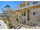 Exterior view of a beige building with a stairwell on a bright day at 1979 Cutlass Dr # 1979, Henderson, NV 89014