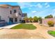 Large backyard featuring a manicured lawn, desert landscaping, and patio, offering a versatile outdoor space at 4708 Grand Rock Dr, North Las Vegas, NV 89081