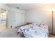 Well-lit bedroom with neutral walls and access to the ensuite bathroom at 4708 Grand Rock Dr, North Las Vegas, NV 89081