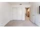 Spare bedroom with a double closet with access to the ensuite bathroom at 4708 Grand Rock Dr, North Las Vegas, NV 89081