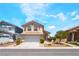 Charming two-story home featuring desert landscaping, and a two car garage at 4708 Grand Rock Dr, North Las Vegas, NV 89081