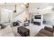 Spacious living room featuring a soaring staircase, and an open floor plan at 4708 Grand Rock Dr, North Las Vegas, NV 89081
