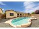 Backyard featuring a sparkling swimming pool, covered patio, and plenty of space for outdoor activities at 5300 E La Terra Ave, Pahrump, NV 89061