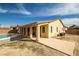 Home exterior with a large backyard featuring pool at 5300 E La Terra Ave, Pahrump, NV 89061
