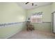 Cozy carpeted bedroom with a window, chair, and soft natural light at 5300 E La Terra Ave, Pahrump, NV 89061
