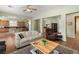 Comfortable and open living area with tile floors, neutral paint, and seamless flow to other rooms at 5300 E La Terra Ave, Pahrump, NV 89061
