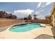 Backyard pool featuring bright blue tile and cool deck surround for hot summer days at 5300 E La Terra Ave, Pahrump, NV 89061