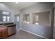 Open-concept kitchen showcasing modern appliances and seamless transition into the living area at 6652 Weeping Pine St, Las Vegas, NV 89149
